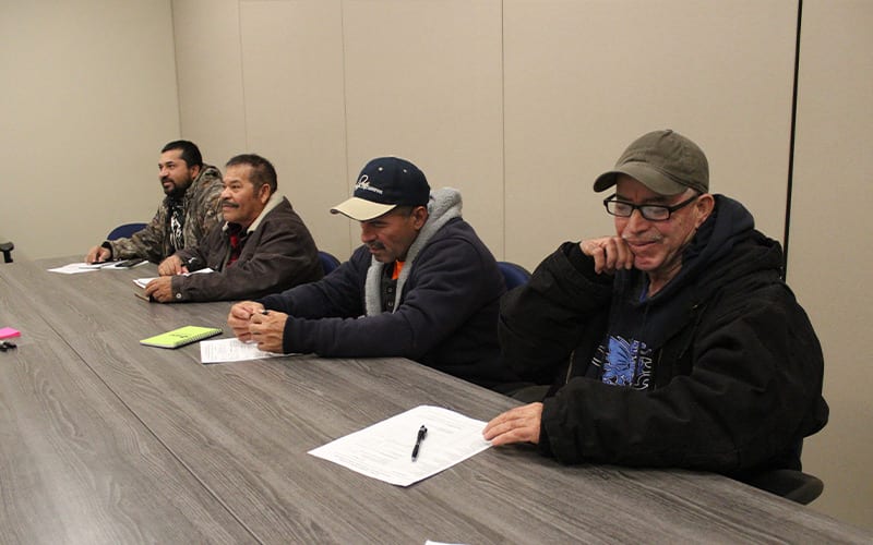 homeless men receiving job training